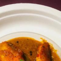 Fish Masala · Fish fillets cooked with traditional sauces.