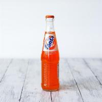 Orange Fanta · 12 fl oz. Made with cane sugar.