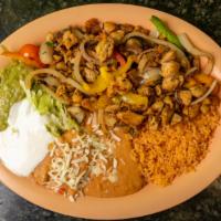Fajita Plate · Meat that is grilled with tomatoes, mushrooms, bell peppers & onions. Meat choices are eithe...