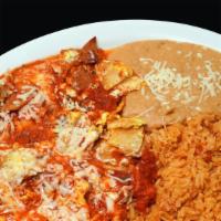 Chilaquiles Verdes Or Rojos · Pieces of tortilla cooked with cheese and a choice of either red or green salsa.