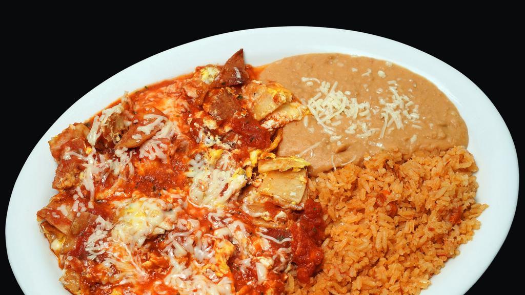 Chilaquiles Verdes Or Rojos · Pieces of tortilla cooked with cheese and a choice of either red or green salsa.