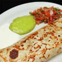 Quesadilla Gigante · 14-inch flour tortilla filled with cheese and choice of meat. Comes with a side of Guacamole...