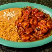 Camarones A La Diabla · Shrimp cooked with bell peppers, hot sauce, onions, and tomatoes. Served with a side of rice...