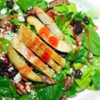 Nutty Bleu Salad · A refreshing choice with glazed pecans, bleu cheese crumbles, craisins, and chopped bacon on...