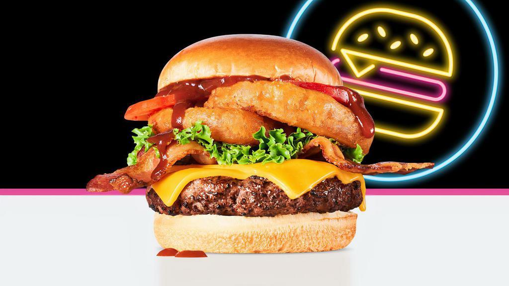 Bbq Burger · Burger, BBQ sauce, cheddar cheese, bacon, onion rings, lettuce & tomato