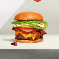 Morning Chomp Burger · American beef patty topped with bacon, fried egg, avocado, melted cheese, lettuce, tomato, o...