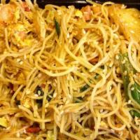 Singapore Style Noodles · Spicy. Singapore style rice noodle with B.B.Q. pork, shrimps, bean sprouts, carrots, other v...