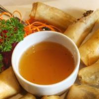 Crispy Rolls · Glass noodles, black mushrooms, cabbage, taro and carrots, served with plum sauce.