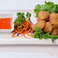 Golden Calamari · Lightly battered calamari, breaded and golden-fried, served with sweet and sour sauce.