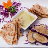 Green Curry Roti · Indian bread, served with green curry and eggplant.