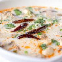 Tom Kha Soup (Small) · Spicy coconut soup with mushrooms, seasoned with lemongrass, kaffir lime leaves, galangal, l...