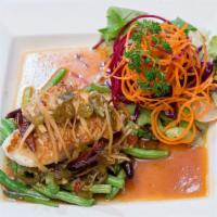 Tangy Sea Bass · Seared sea bass steak, spinach and green beans in tangy ginger sauce.