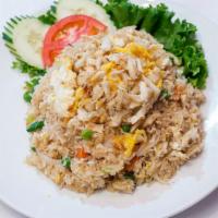 Crab Fried Rice · Fresh lump crab meat, eggs, carrots, peas, onions and scallions.