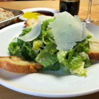 Insalata Cesarina · Romaine lettuce, Grana Padano & focaccia croutons with housemade Caesar dressing Cal/252.
