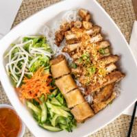 Saigon Vermicelli Bowl  · Choice of grilled chicken, beef, pork or tofu topped with crispy imperial roll and peanuts, ...