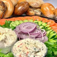 Bagel & Cream Cheese Platter · Platter of 12 assorted bagels of your choice, large cream cheese, mix veggie platter. Bagel ...