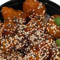Orange Chicken Rice Bowl · Breaded chicken and fried, coated with the sweet and sour orange sauce. Served over steamed ...