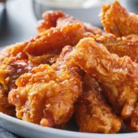 Thai hot pot wings · Battered fried chicken wings, then flavored with Thai hot pot sauce.