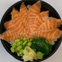 Sake Don · Eight pieces salmon sashimi over sushi rice.