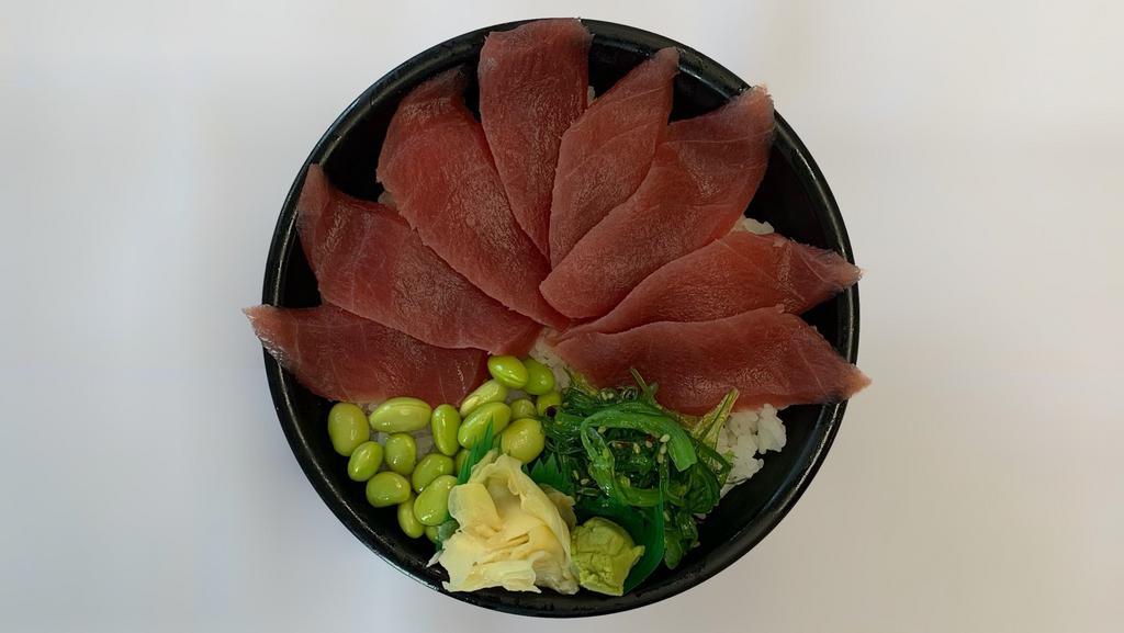 Tekka Don · Eight pieces red tuna sashimi over sushi rice.