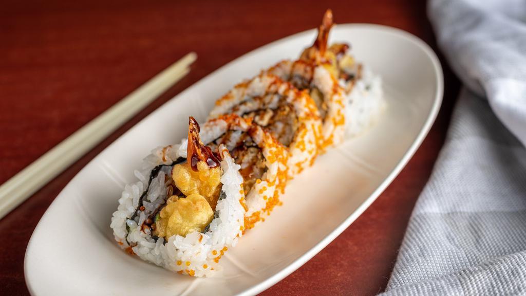 Crunchy Roll (5 Pieces) · Shrimp tempura, eel, avocado inside and tobiko outside with eel sauce.
