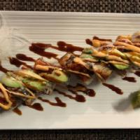 Dragon Roll (8 Pieces) · Crab mix inside and eel, avocado outside.