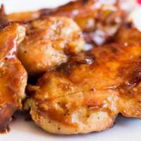 BBQ Chicken · Half chicken baked in the oven for tenderness, then barbequed and topped with a light moppin...