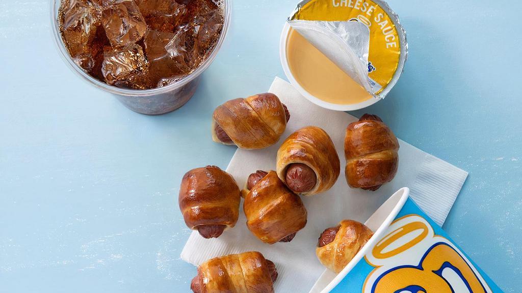 Mini Pretzel Dogs Bundle · An order of Mini Pretzel Dogs paired with any dip, and and a medium soft drink.
