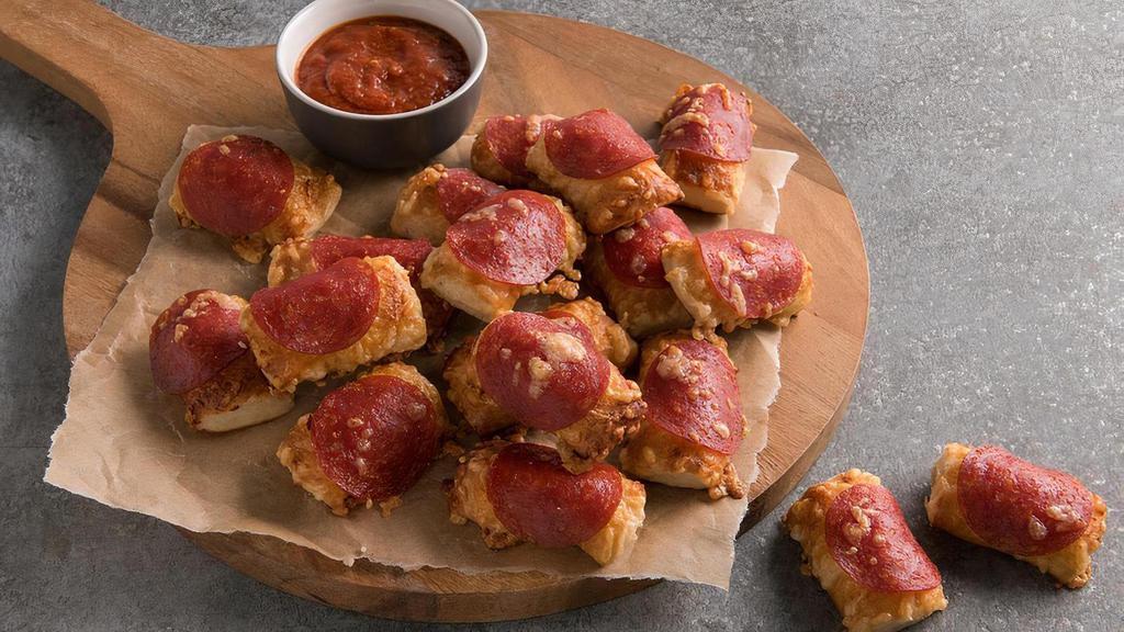 Pepperoni Pretzel Nuggets · The Pepperoni Pretzel you know and love, available bite-size! Each nugget is topped with a slice of pepperoni and a sprinkle of three-cheese blend.