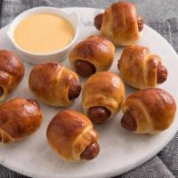 Mini Pretzel Dogs · Bundled up one at a time and baked fresh every time. Mini Pretzel Dogs made with Nathan’s Fa...