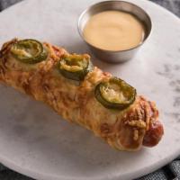 Jalapeno Cheese Pretzel Dog · A crispy three-cheese pretzel, topped with spicy jalapeño slices wrapped around a delicious ...