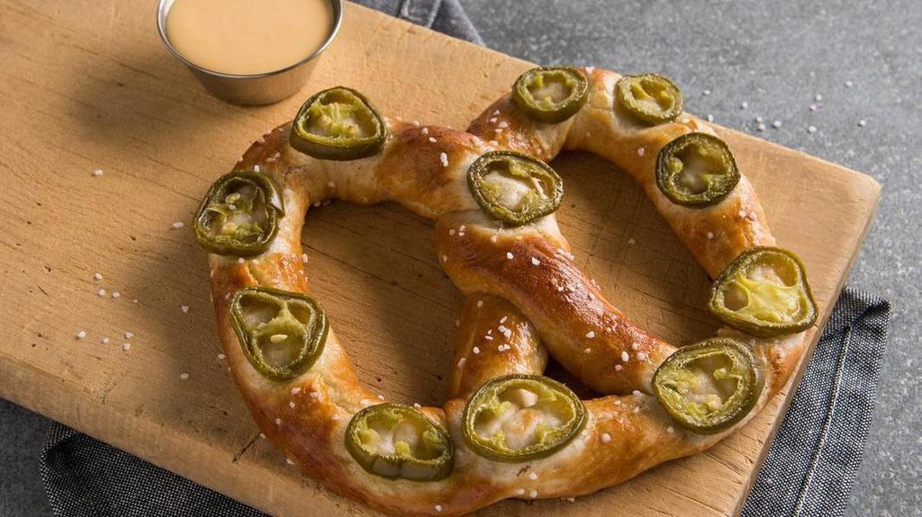 Jalapeno Pretzel · Spice up your snacking experience with a Jalapeno Pretzel. Our Original Pretzel topped with delicious jalapeno peppers, hot from the oven.