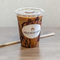 Iced Dark Mocha · Extra Dark Chocolate melted by Two Shots of Espresso all tied together by your Option of Cre...