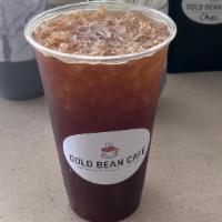 Iced Americano · Two Shots of Espresso mixed with Fresh Water in order to taste our Organic Creamy Espresso S...