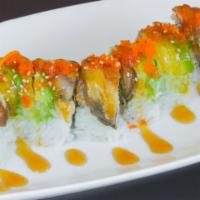 Dragon Roll (8 pcs) · Unagi and avocado over shrimp tempura, cucumber and avocado roll with tobiko.