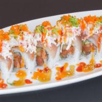 Harley Davidson Roll (8 pcs) · Seared albacore, crab salad and tobiko over spicy tuna and cucumber roll.
