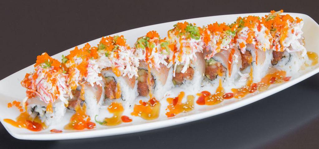 Harley Davidson Roll (8 pcs) · Seared albacore, crab salad and tobiko over spicy tuna and cucumber roll.