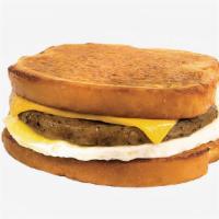 Sausage, Egg, and Cheese French Toast Sandwich · Chicken sausage, fried egg, and cheddar cheese sandwiched between two slices of classic Fren...