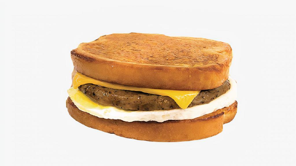 Sausage, Egg, and Cheese French Toast Sandwich · Chicken sausage, fried egg, and cheddar cheese sandwiched between two slices of classic French toast. Served with syrup on the side.