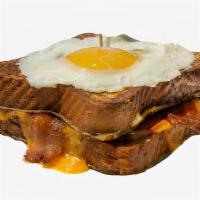 Bacon, Egg & Cheese French Toast Sandwich · Bacon, fried egg, and Cheddar cheese sandwiched between two slices of classic French toast. ...