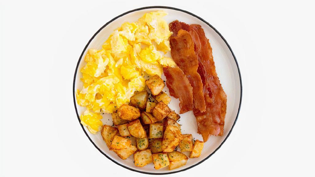 Classic Breakfast Combo · Two scrambled eggs with two slices of buttered toast, and your choice of meat and breakfast side.