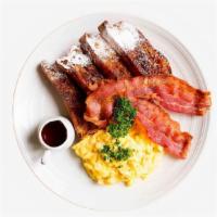 Classic French Toast Breakfast Combo · Two scrambled eggs, two slices of French toast, syrup, and your choice of meat and breakfast...