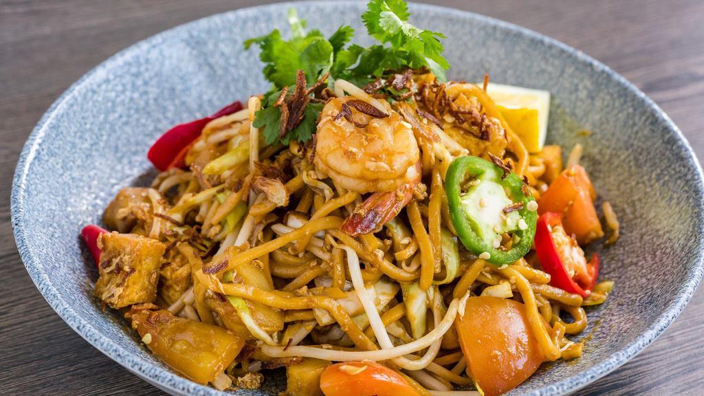 Mie Goreng · spicy egg noodles, shrimp, tofu, tomatoes, 
potatoes, cabbage, bean sprouts,   
vegetarian available