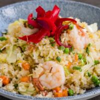 Nasi Goreng · spicy coconut fried rice, peas, carrots, egg, cabbage, pickled onions