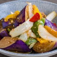 Wok Fired Eggplant · chinese eggplant, bell peppers, sweet onions, 
oyster sauce, vegetarian available