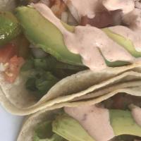 Shrimp or Fish Taco · Lettuce, chipotle sauce, pico de gallo with a touch of avocado.