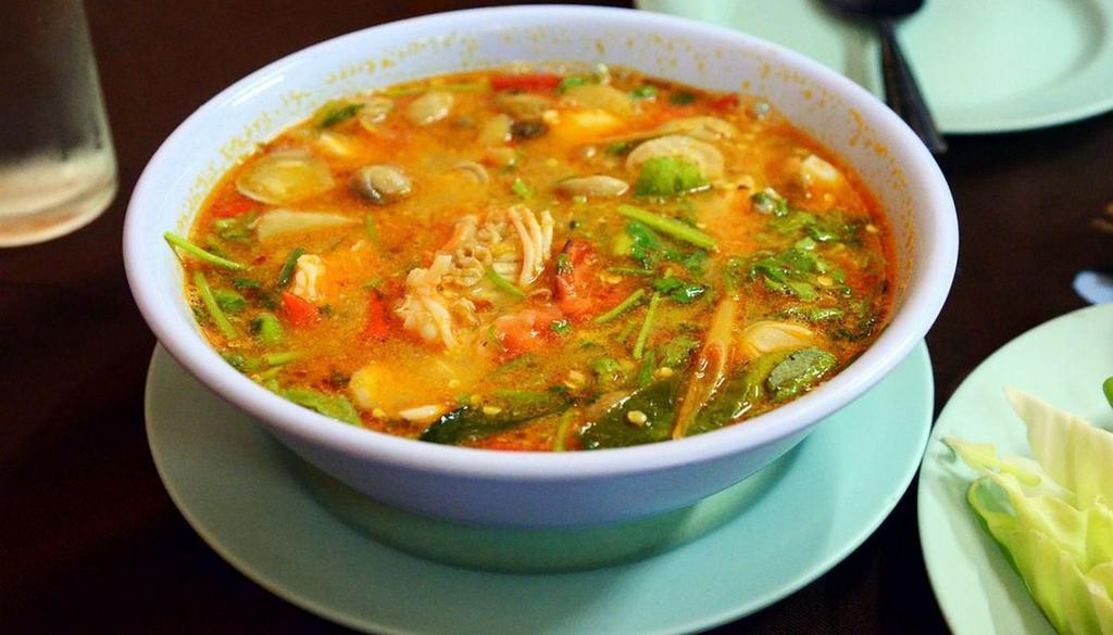 Veggie Tom Yum Goong (S) · Spicy and sour soup with mushrooms and mixed vegetables