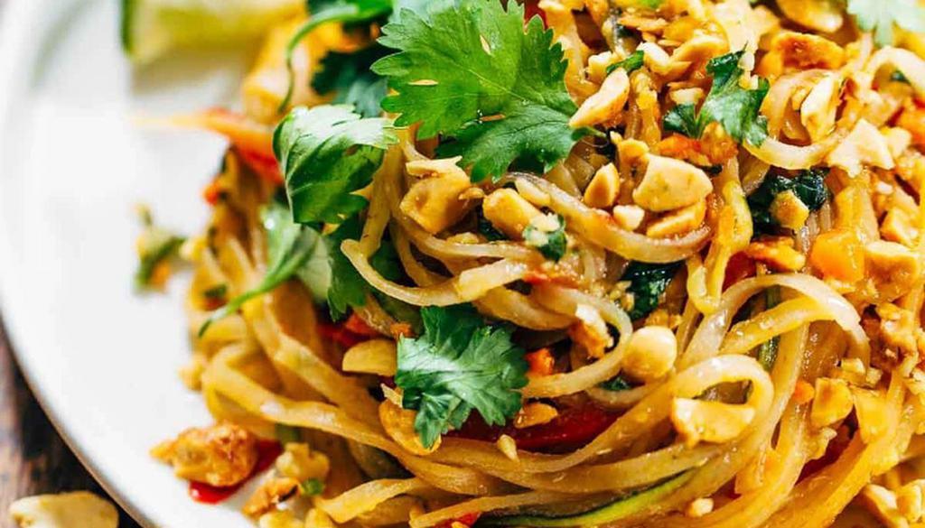 Veggie Pad Thai · Pan fried rice noodles with eggs, tofu and ground peanuts