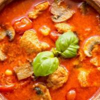 Red Curry Chicken · Sliced chicken with mixed vegetables in curry sauce