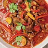 Red Curry Beef · Sliced beef with mixed vegetables and malaysian spices in red curry sauce